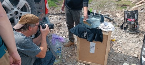 Making scientific photographs of various fish species on Margilansay river, Fergana valley
